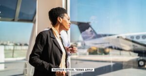 First look: Inside Korean Air’s stunning new flagship lounge at LAX a hand holds a credit card