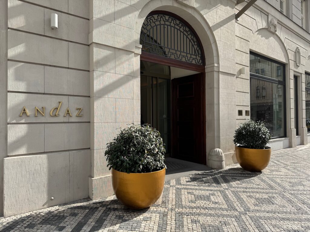 a building with plants in pots