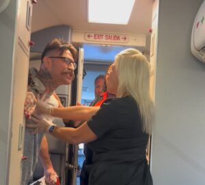 a woman holding a man