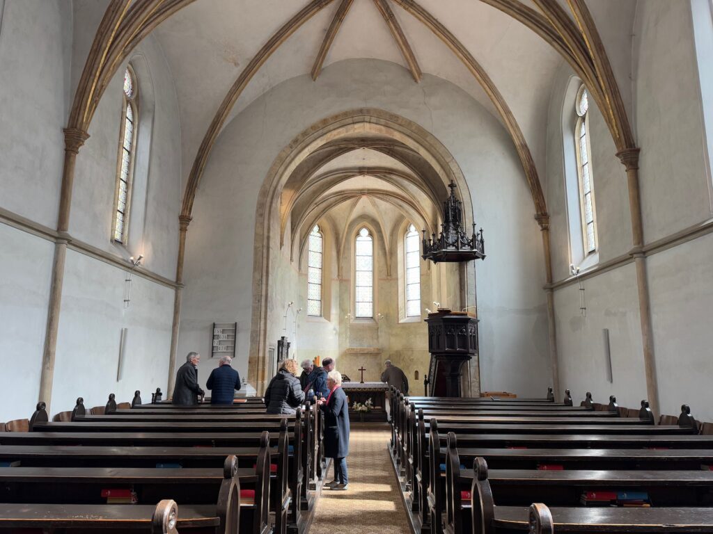 a group of people inside a church