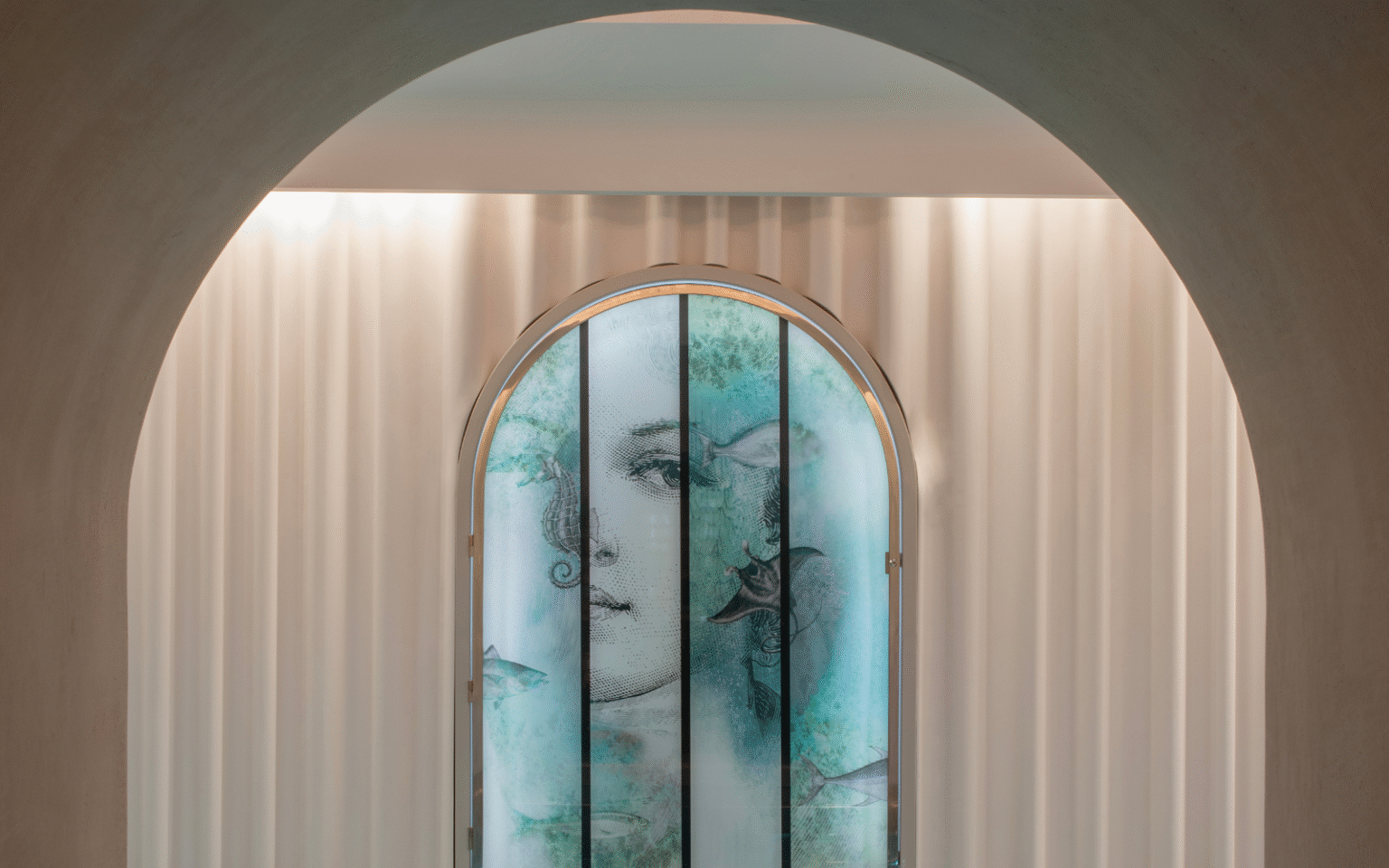 Lit archway in the spa of Le Negresco_Nice, France. Part of the pool
