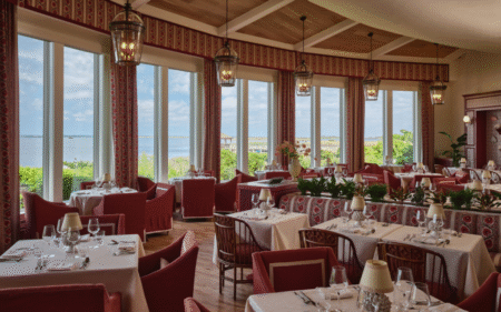 Restaurant area in burgundy colour at Sanderson Resort