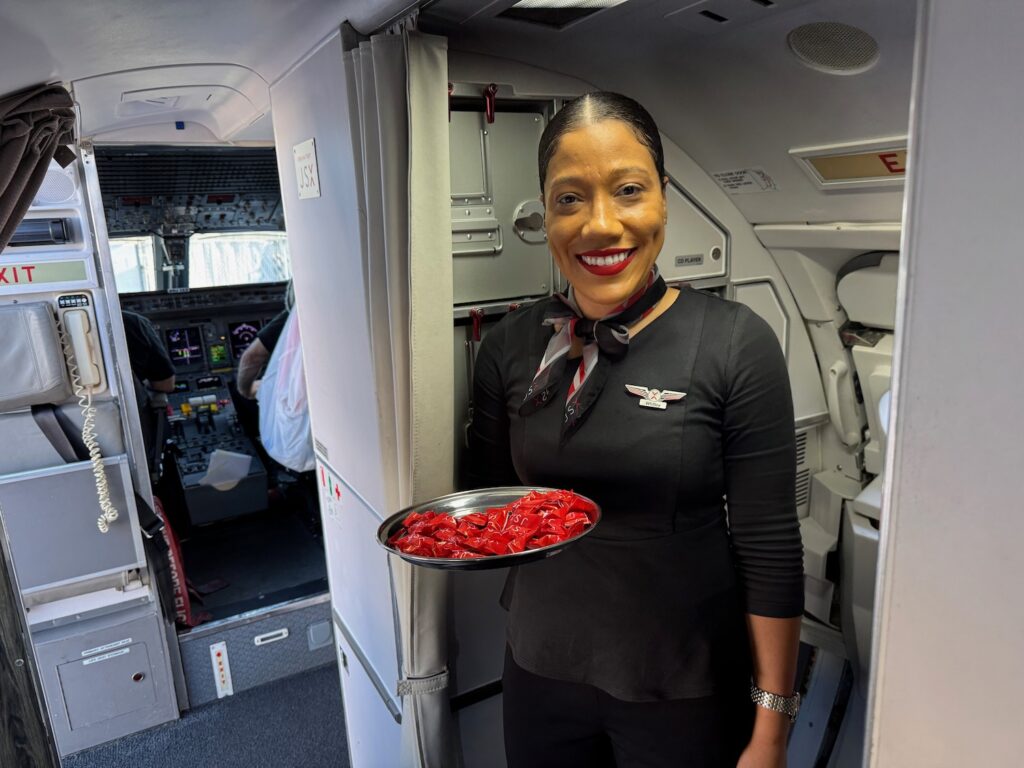a woman holding a tray of food