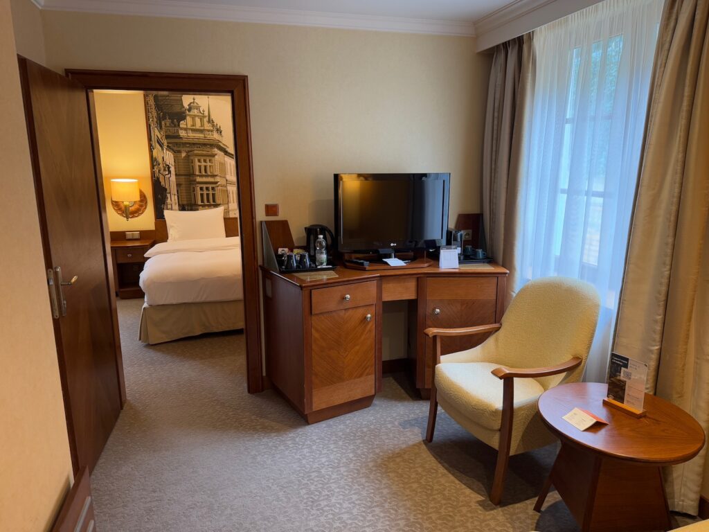 a room with a television and a chair