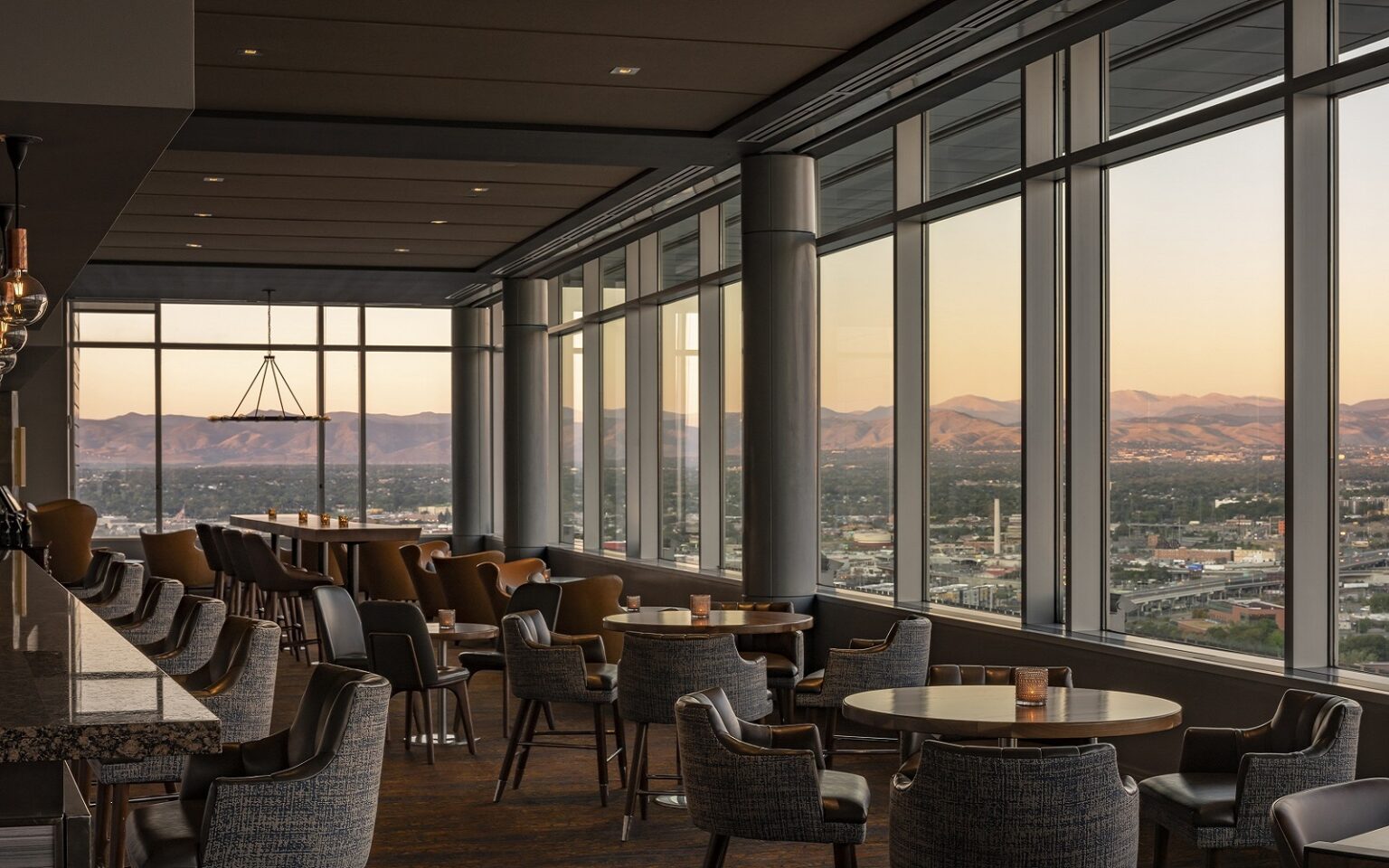 mountain view from top floor restaurant in Hyatt Regency Denver