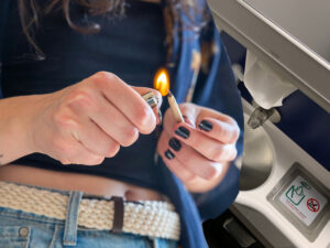 a person lighting a match