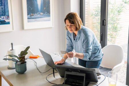 Man making an online purchase at home