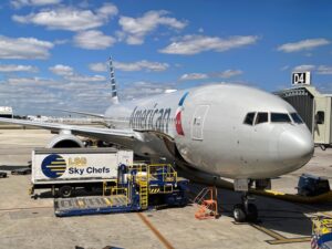 A $3,600 American Airlines Bump Offer To Barcelona? Yes, Please. a plane parked at an airport