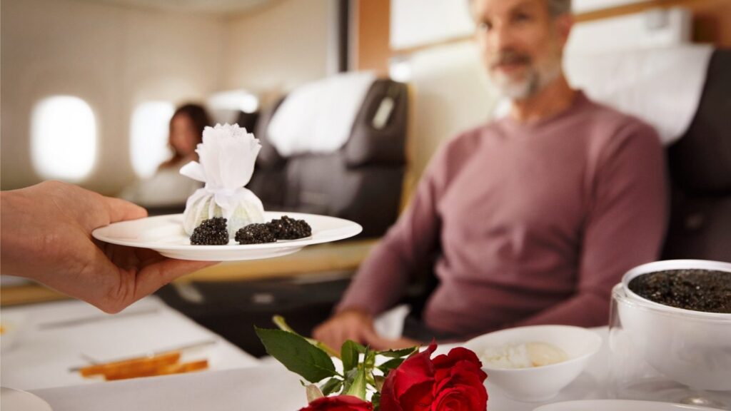 a person holding a plate of food