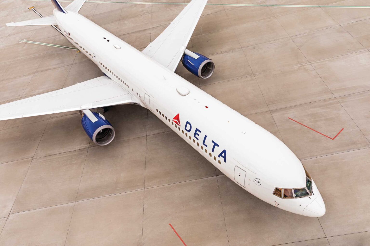 Delta Air Lines Drops Geneva Flights In Latest JFK Pullback an airplane on the ground