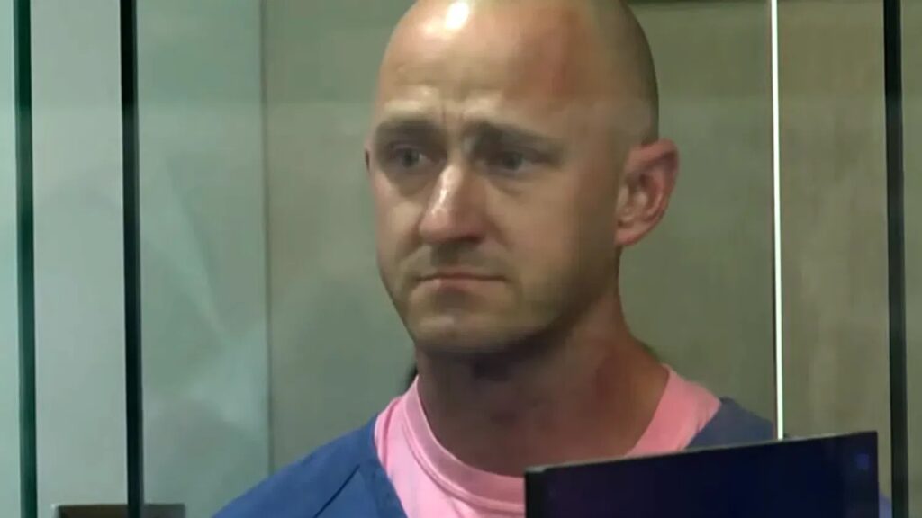 a man in a blue shirt