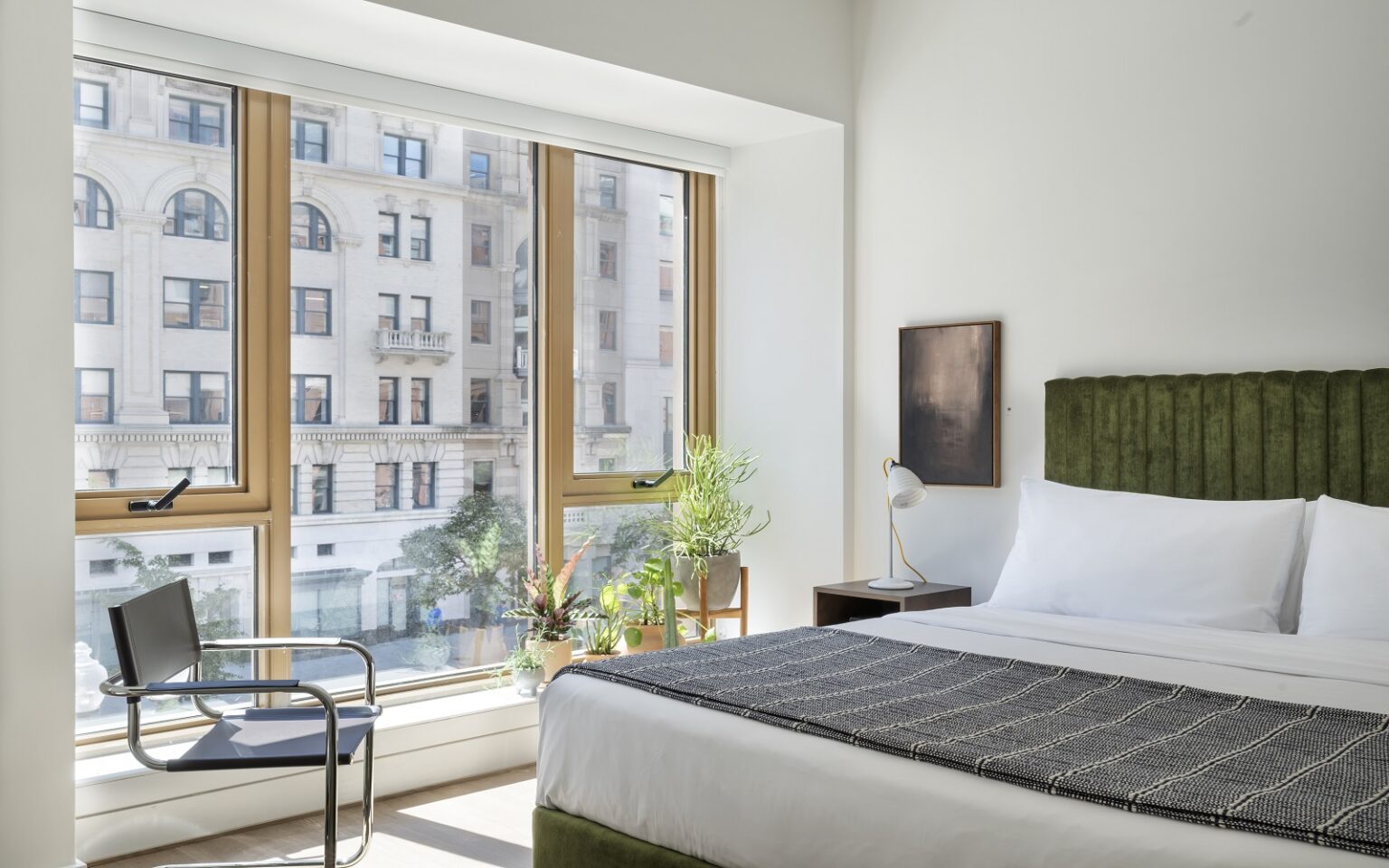 ROOST debuts in Washington, D.C. view from bed in aparthotel ROOST Washington DC with city view