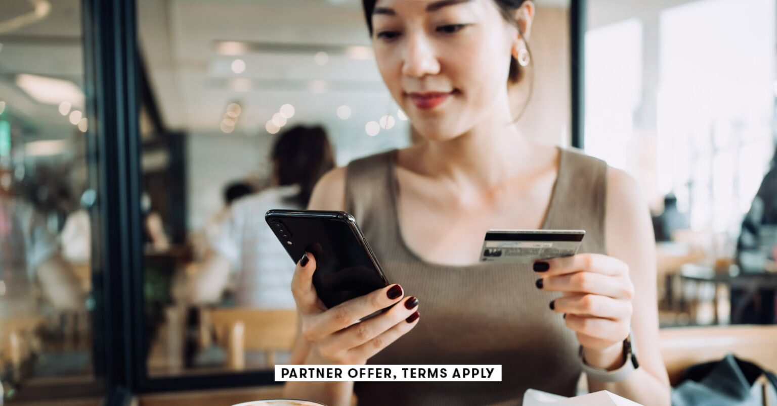 Capital One Spark Miles for Business credit card review: Double miles on everything a hand holds a credit card