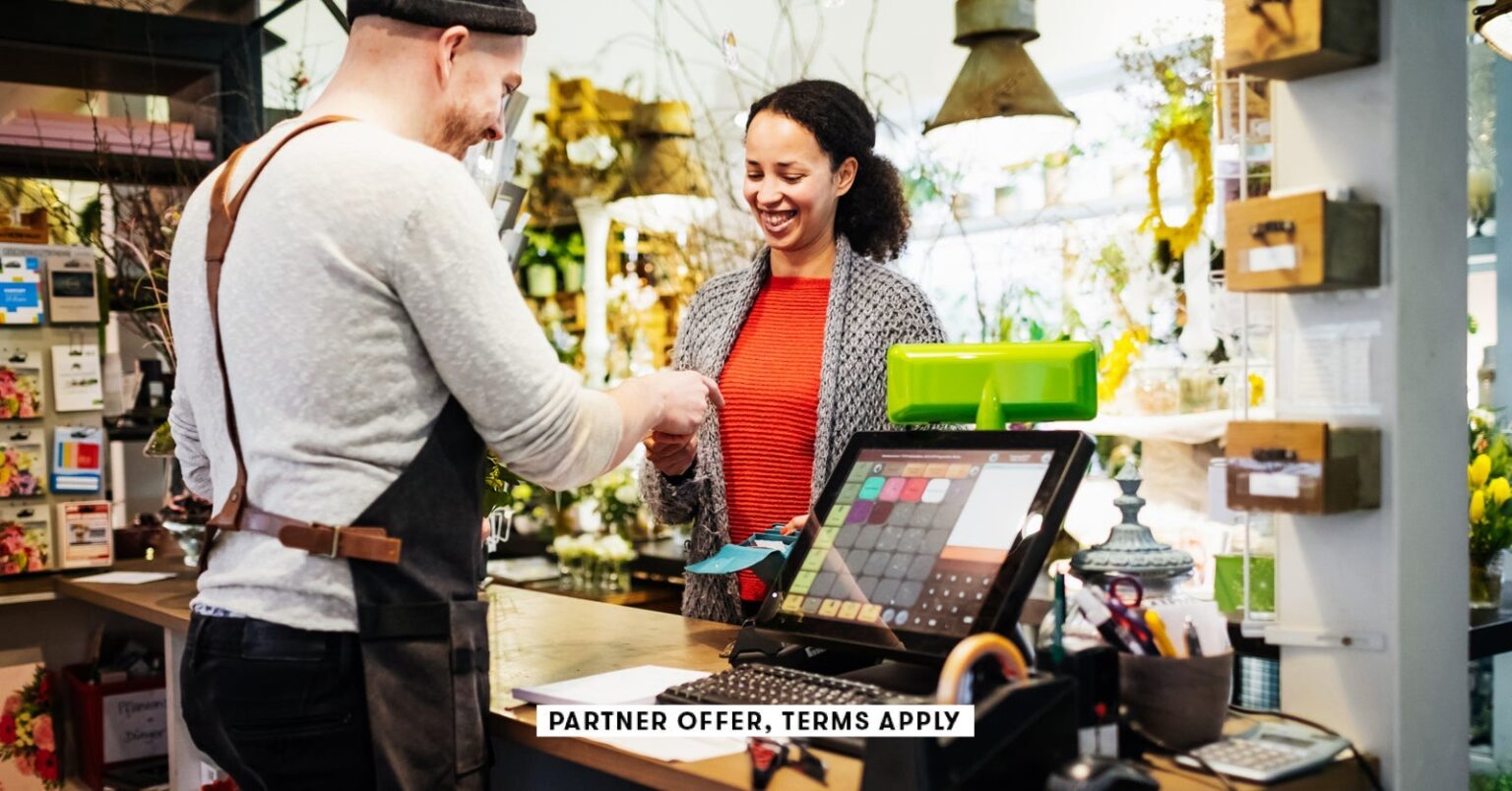 Woman sitting on the floor with a laptop