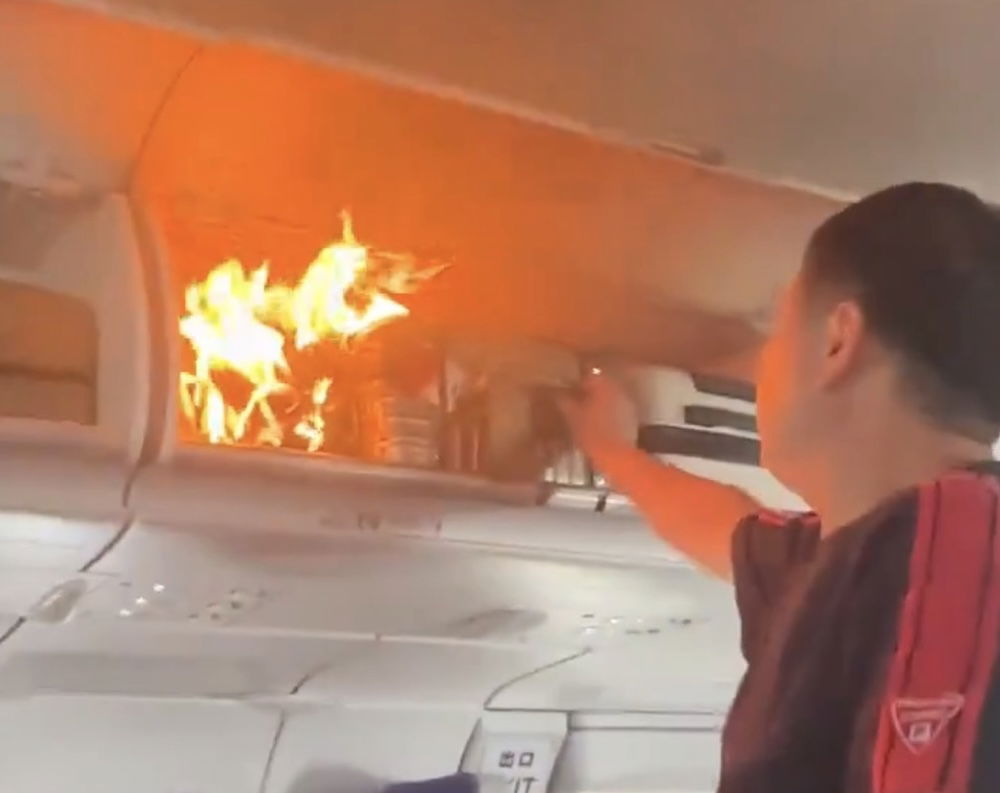 Air China Flight Diverts After Battery Catches Fire In Overhead Bin Air China Flight Diverts After Battery Catches Fire In Overhead Bin
