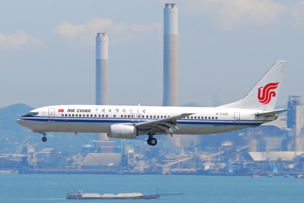 U.S. To Ban Chinese Airlines From Using Russian Airspace, A Fair But Imperfect Move a plane flying in the air