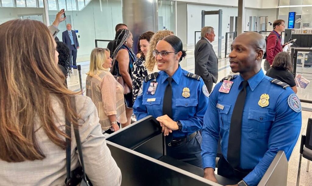 Airports Refuse To Play Kristi Noem’s Partisan TSA Video Blaming Democrats For Shutdown a group of people in uniform
