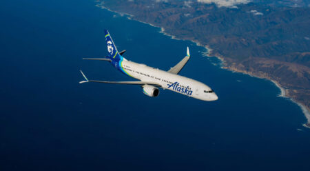 an airplane flying over water