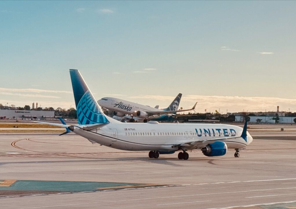 Alaska Airlines Pivots On West Coast, Handing A Gift To United Airlines a group of airplanes on a runway
