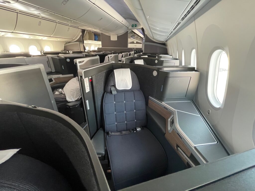 Black British Airways Passenger Claims He Was Skipped For Welcome Drink Because Flight Attendant Thought He “Didn’t Belong” In Business Class a seat in an airplane