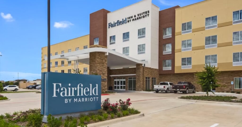 Marriott In Texas Caught Charging Fake “City Fee” For Parking, Even If You Didn’t Park a building with a sign in front of it