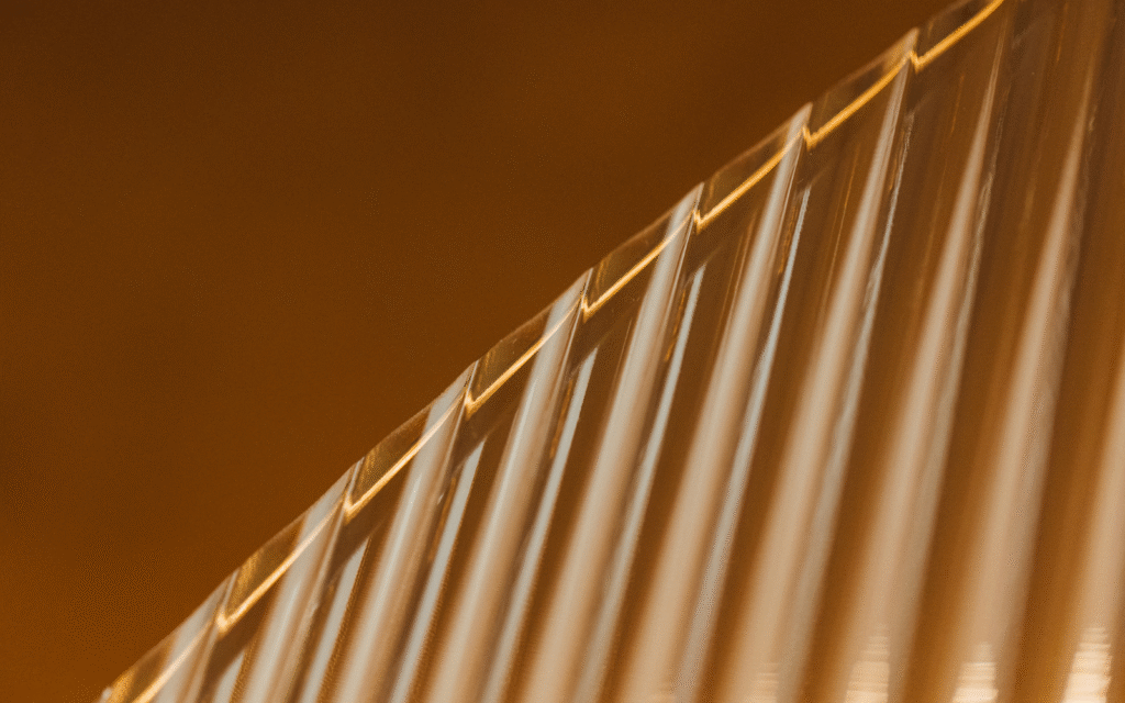 Bespoke glass for beautiful bathrooms by Majestic London Fluted amber glass from Majestic London