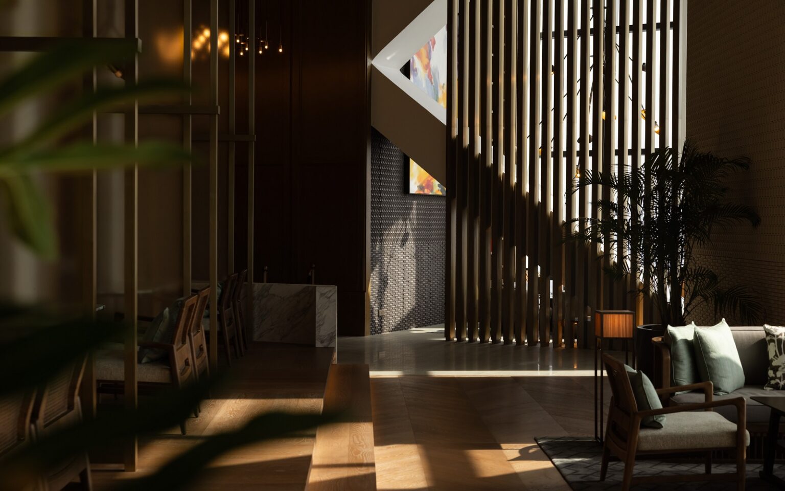 GA Group unveils interiors for first Park Hyatt in Malaysia filtered sunlight and shadows through slatted wooden screen in Cacao BarPark Hyatt Kuala Lumpur with interiors by GA Group