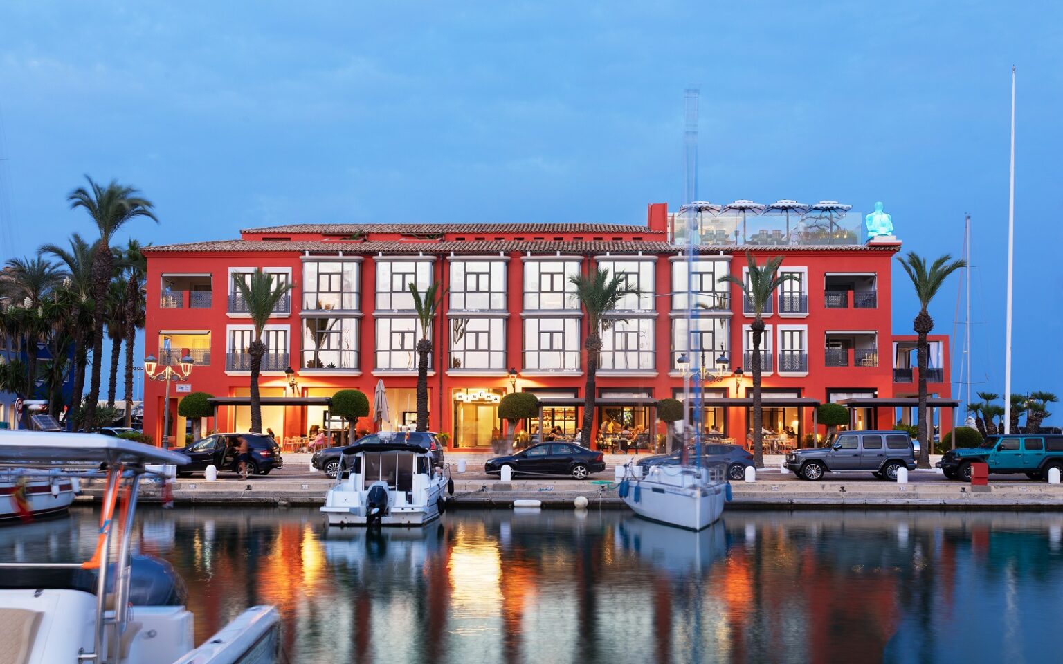 Meliá Hotels International to manage MiM Hotels hotel facade with boats and harbour lights at MiM Sotogrande