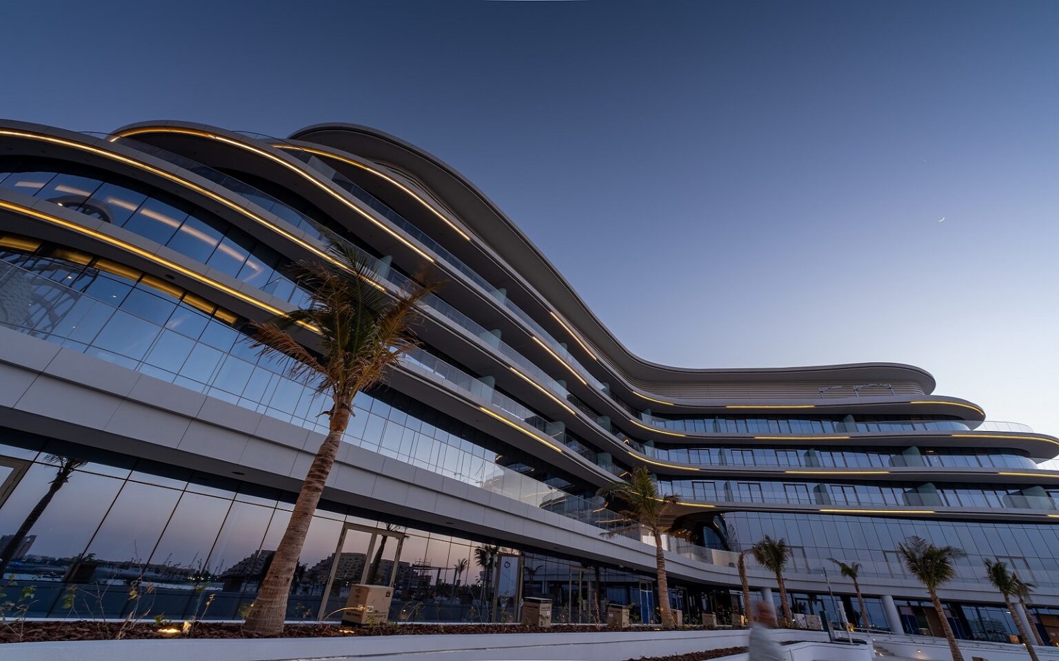 Ennismore announces opening of first lifestyle all-inclusive resort in Ras Al Khaimah curved and contemporary exterior of SO Ras AL Khaimah