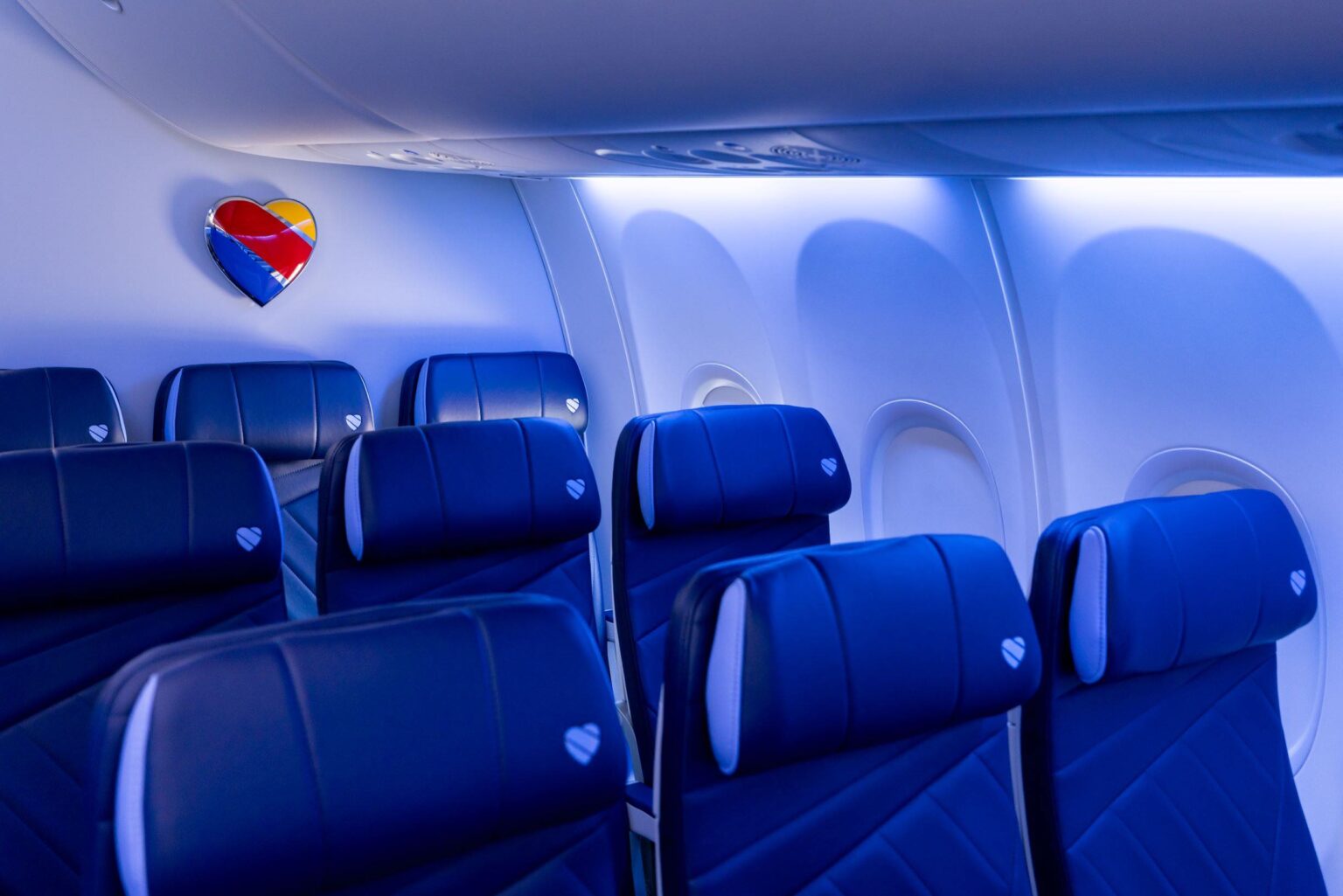 Southwest Airlines Tightens Plus-Size Policy…And It’s Actually Fair a blue seats in an airplane