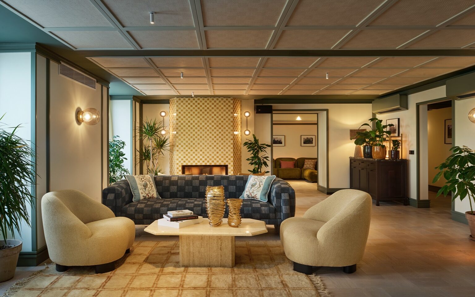 Sircle Collection takes The Cover to Vienna tub chairs and sofa around coffee table in The Cover Vienna