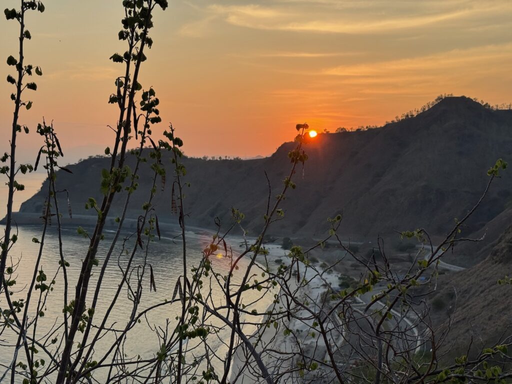 a sunset over a river