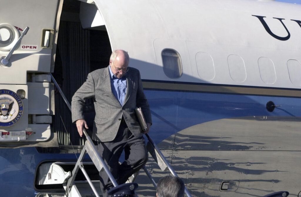 a man walking down a plane