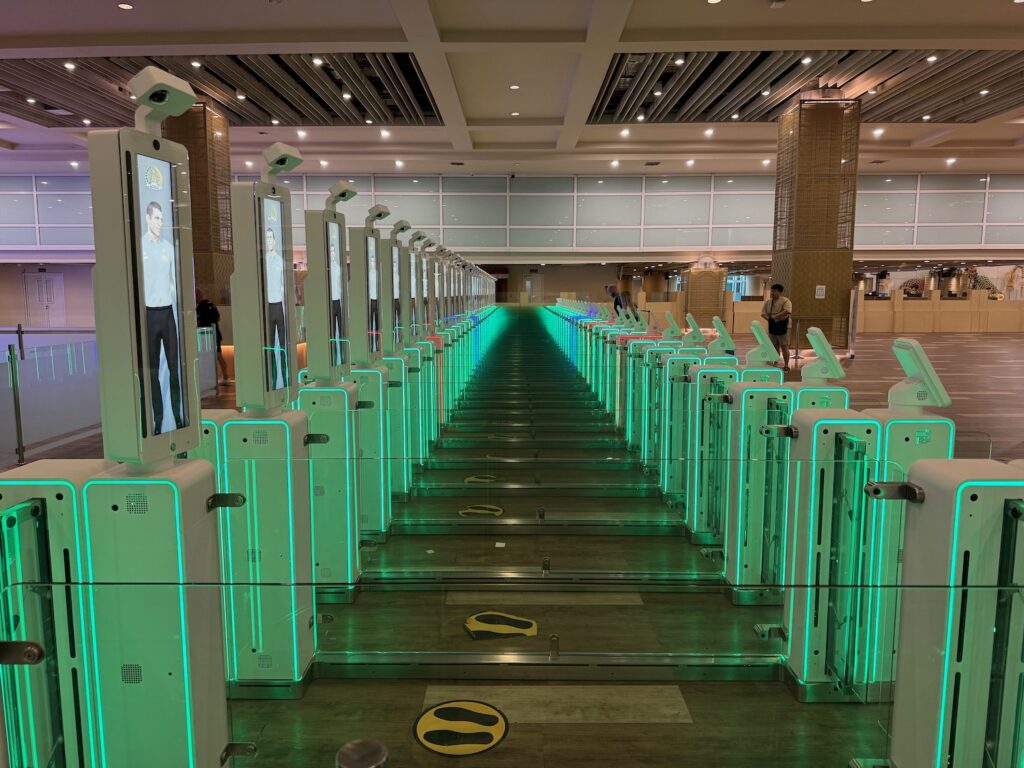 a row of green turnstiles
