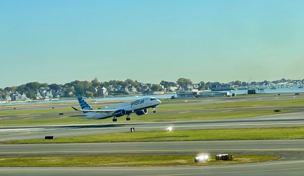 an airplane taking off from a runway