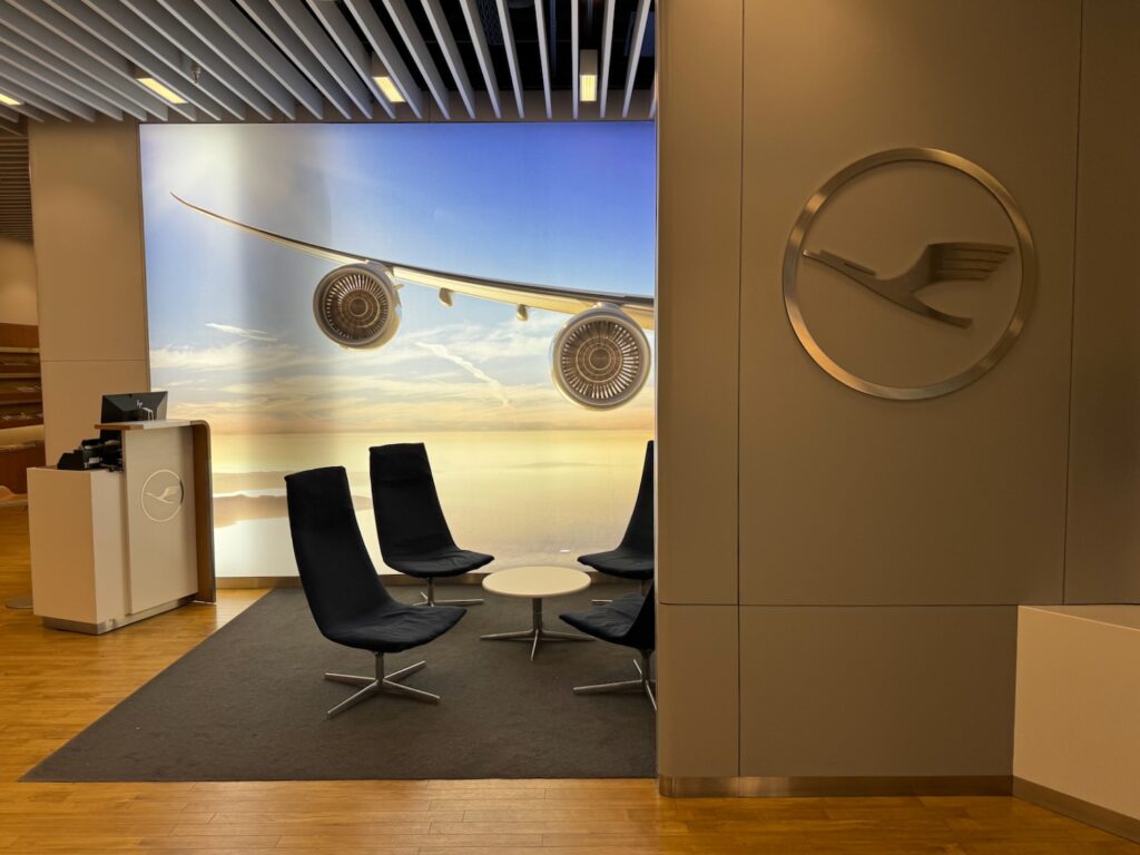 Lufthansa Senator Lounge entrance at London Heathrow Terminal 2, featuring signage for Business Lounge and Lounge A1, emphasizing spacious design and accessibility.
