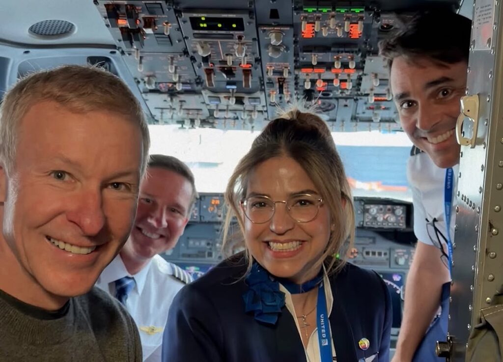 a group of people in a cockpit