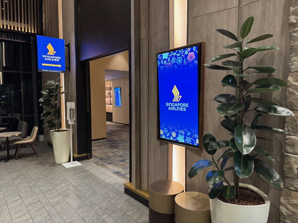 Singapore Airlines Has A Hidden Lounge In Jakarta a sign in a building