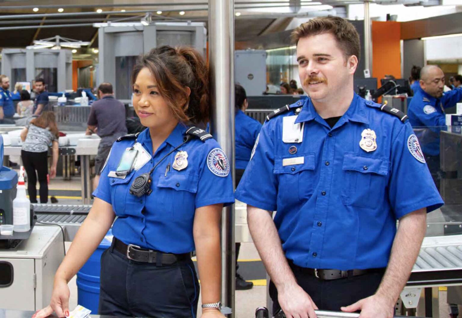a man and woman in uniform
