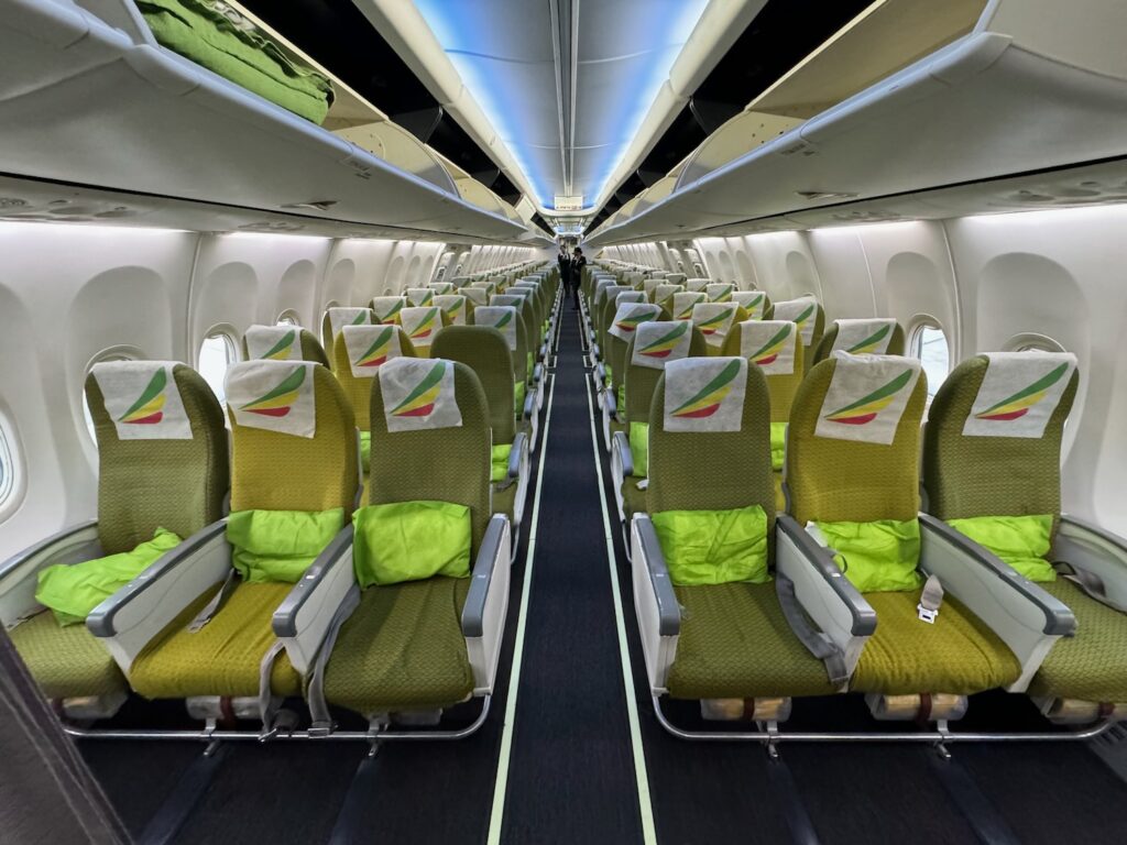 rows of seats on an airplane