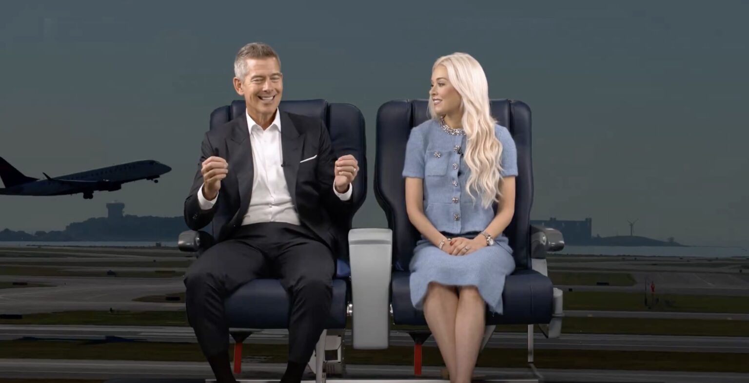 a man and woman sitting in chairs