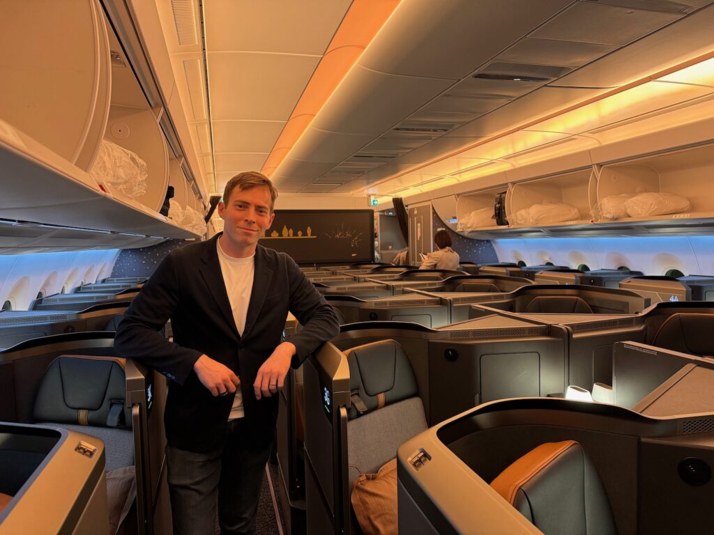 a man standing in an airplane
