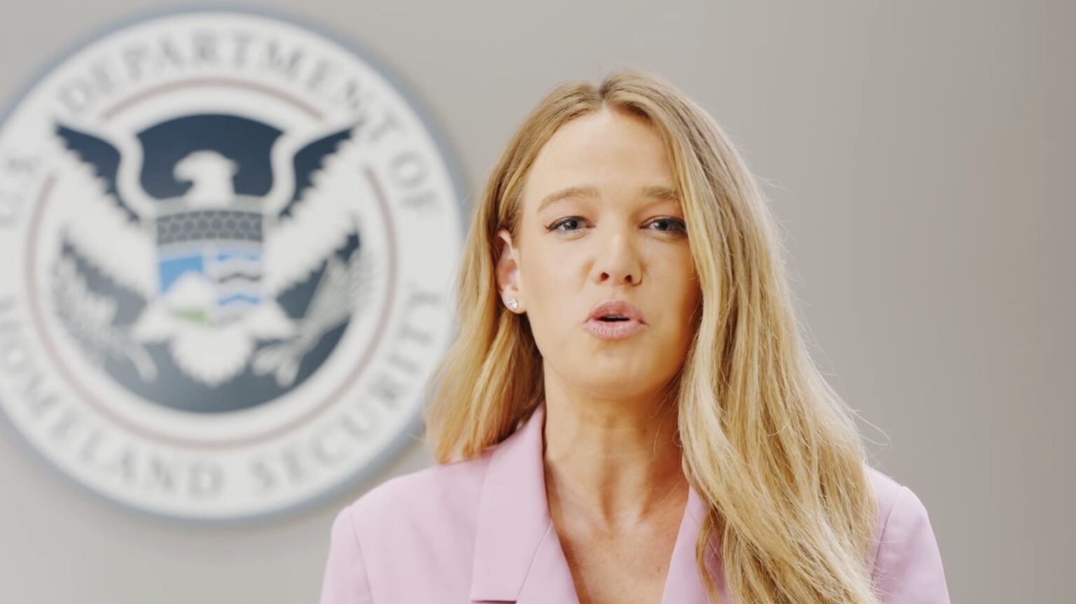 a woman with long blonde hair