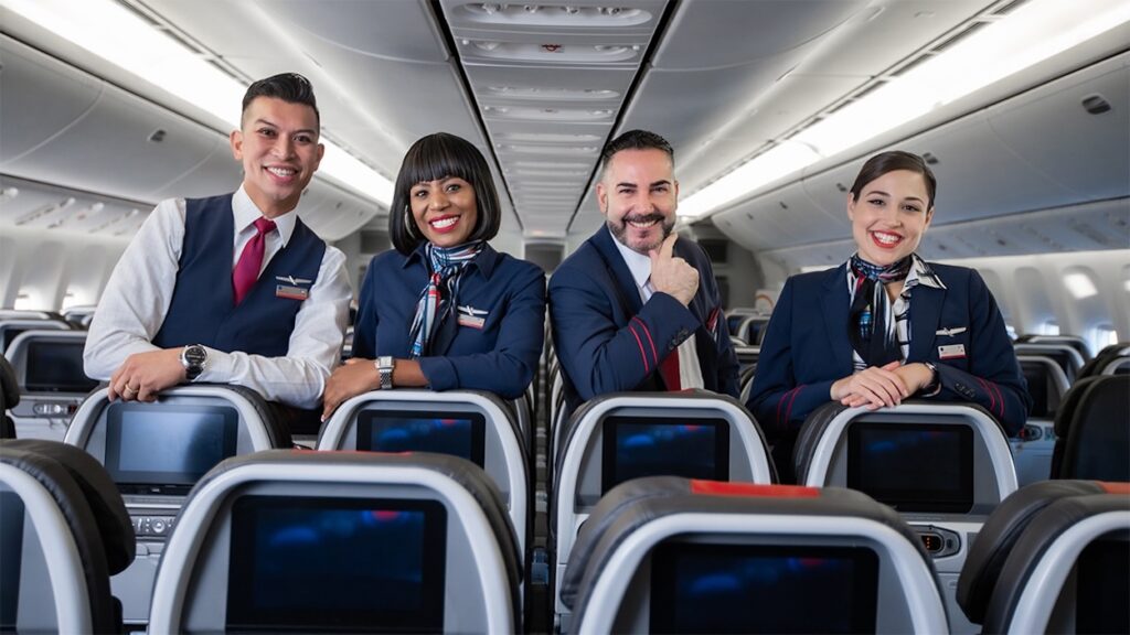 a group of people in uniform sitting on an airplane