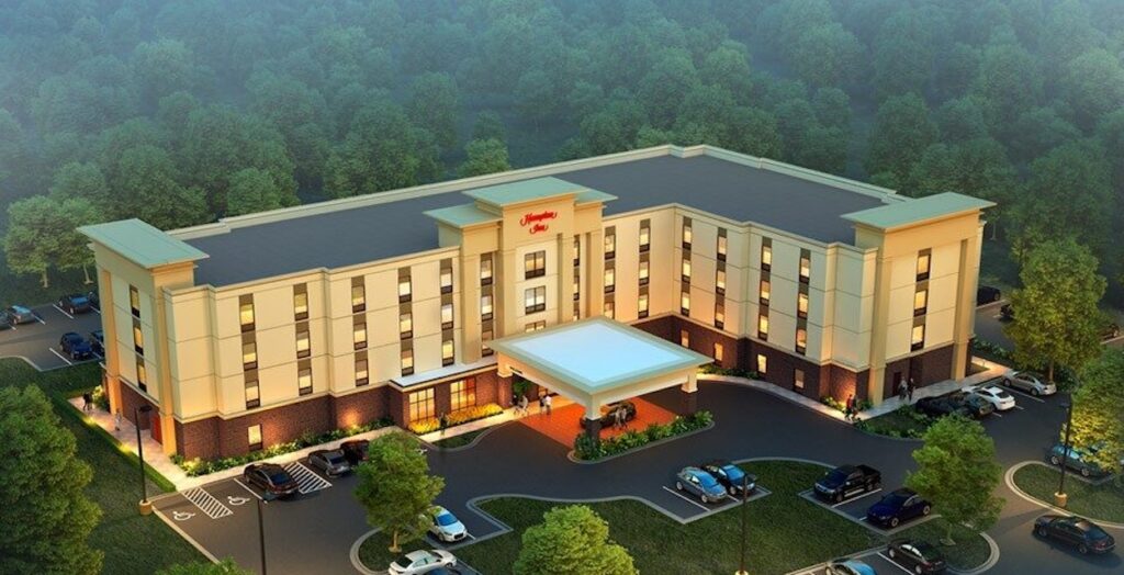 a building with cars parked in front of it