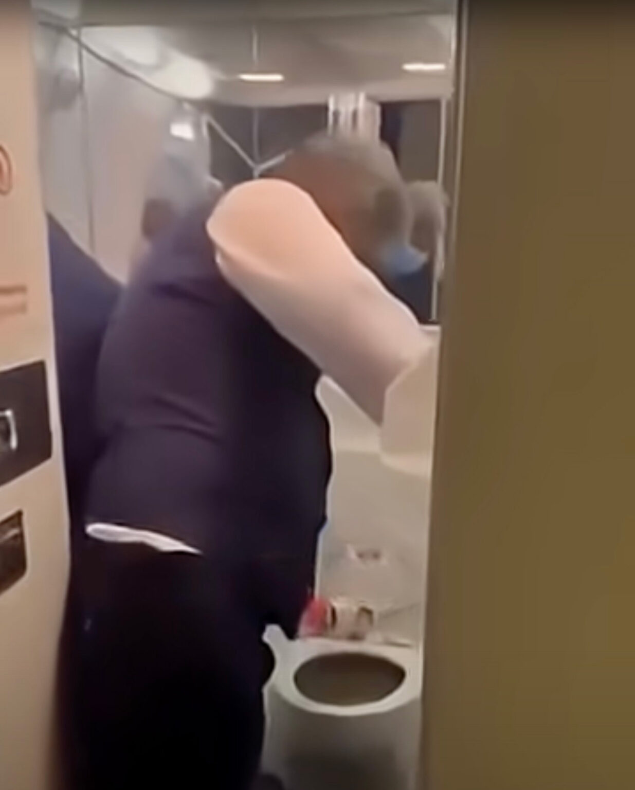 a man in a blue shirt