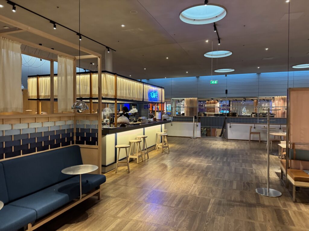 a room with a couch and tables