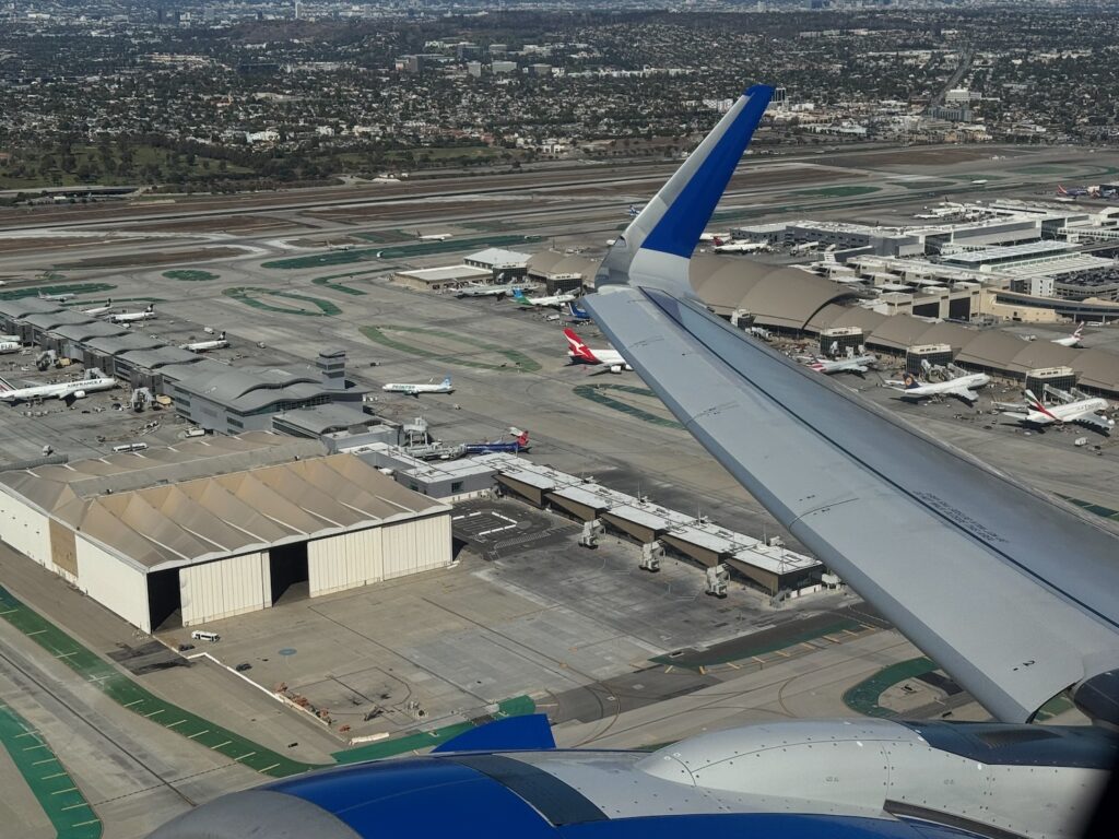 an airplane wing in the air