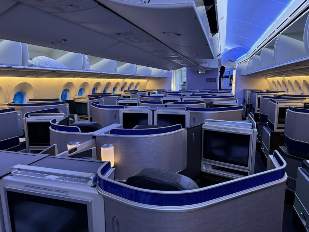 an airplane with rows of monitors