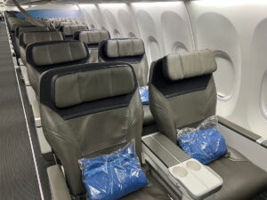 American & Alaska Reciprocal Upgrades For Elites (First Class & Extra Legroom)